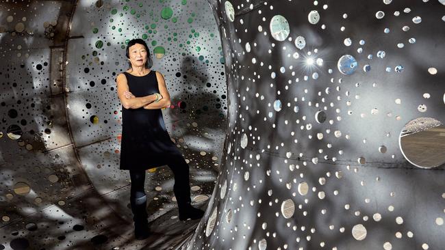 Lindy Lee with Ouroboros, the National Gallery of Australia’s landmark $14 million acquisition. Photo: Josef Ruckli