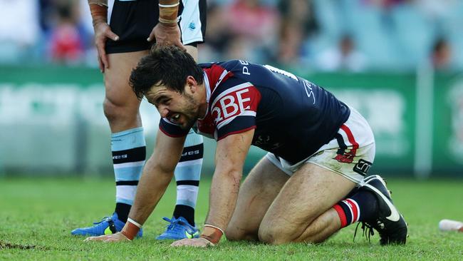 Roosters Aidan Guerra is injured during the Sydney Roosters v Cronulla Sharks rugby league game at Allianz Stadium, Sydney. Pic Brett Costello