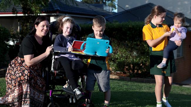 Sydney mother Sally Ryan with children Maddison, 8, William, 6, Matilda, 10, and one-year-old Isabella. Picture: Jane Dempster