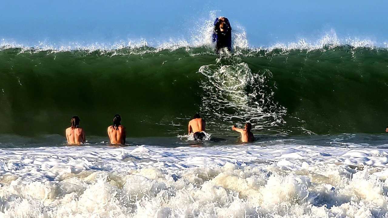 Bodysurfers make the most of the swell off Mooloolaba generated by Cyclone Gretel. Shot using Samsung Galaxy S20 Ultra. Picture: Mark Furler