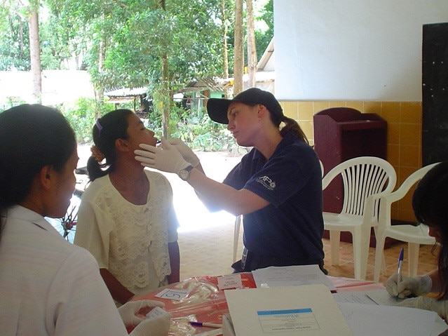 Wright in Myanmar taking DNA samples from family members of people who went missing after the December 2004 tsunami.