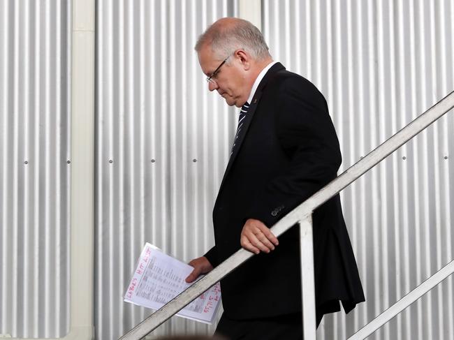 Scott Morrison carrying a document titled "Labor's Hit List". Picture Gary Ramage