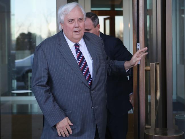 Power play … Clive Palmer leaves Parliament House yesterday. Picture: Cole Bennetts/Getty Images