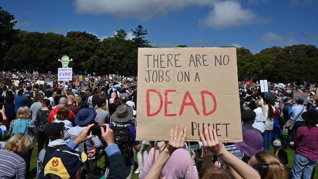 Thousands of protesters have poured into the Domain calling for action to guard against climate change. Similar rallies were planned for around the world. Picture: AFP