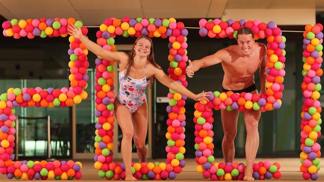 Olympic swimming hopefuls Chelsea Hodges and Tristan Hollard are counting on 2021 being their year while playing with a display from Gold Coast Balloons at Gold Coast Aquatic Centre. Picture Glenn Hampson