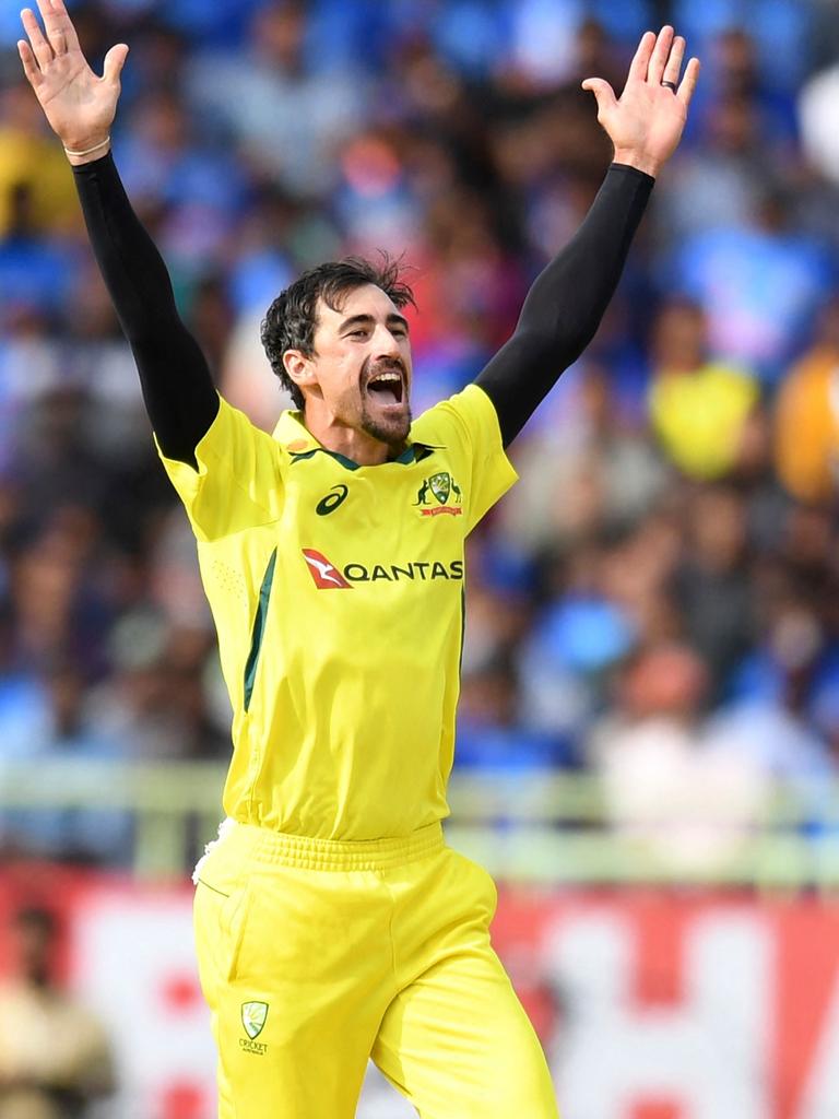 Mitchell Starc celebrates after taking the wicket of Mohammed Siraj. Picture: AFP