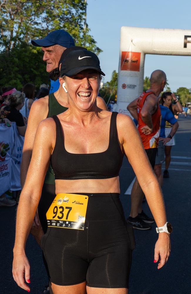 Katie Woolf crosses the finish line at the 2025 edition of the annual NT City2Surf, Sunday, June 1. Picture: Pema Tamang Pakhrin