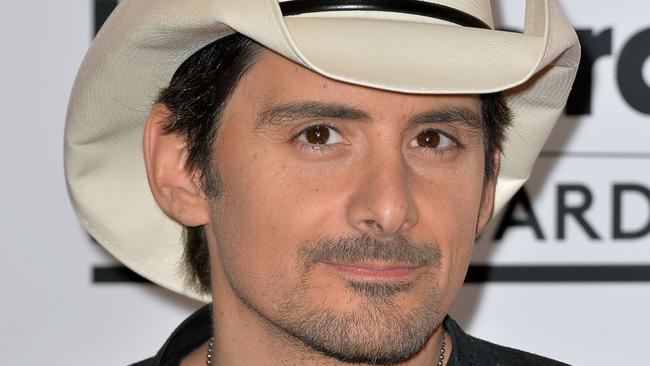 LAS VEGAS, NV - MAY 18: Musician Brad Paisley poses in the press room during the 2014 Billboard Music Awards at the MGM Grand Garden Arena on May 18, 2014 in Las Vegas, Nevada. Frazer Harrison/Getty Images/AFP== FOR NEWSPAPERS, INTERNET, TELCOS & TELEVISION USE ONLY ==