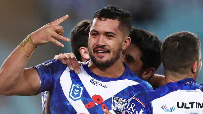 SYDNEY, AUSTRALIA - APRIL 26: Corey Harawira-Naera of the Bulldogs celebrates with teammates after scoring a try during the round 7 NRL match between the Canterbury Bulldogs and the North Queensland Cowboys at ANZ Stadium on April 26, 2019 in Sydney, Australia. (Photo by Matt King/Getty Images)