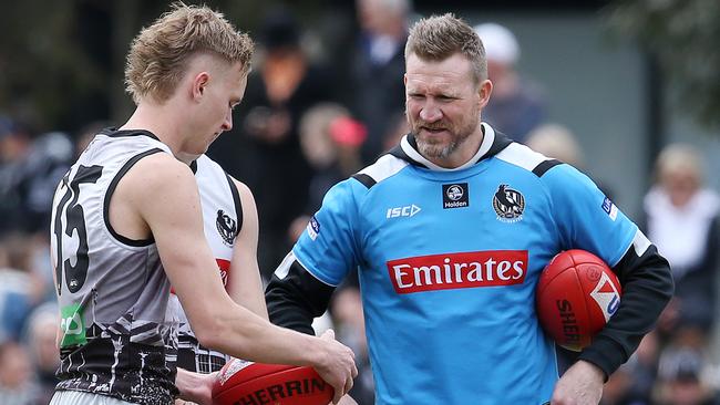 Collingwood coach Nathan Buckley talks with Jaidyn Stephenson. Pic: Michael Klein