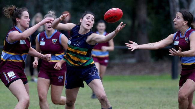 Margaret Gleeson marks under pressure for St Kevin’s against Marcellin on Saturday. Picture: Mark Dadswell