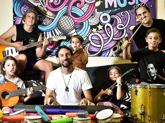 Darcy Dickenson, 14, Cooper Davis, 21, Harry Perrin, 9, Sunny Hagiaglou, 3, Zara Perrin, 7, Noah Power, 9, and Costa Hagiaglou. Local music teacher Costa Hagiaglou has relocated his music school to Denham Street, North Ward from his home. PICTURE: MATT TAYLOR.