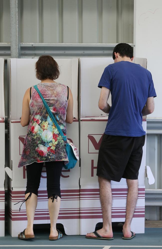 Cairns constituents turn out to cast their votes in the Queensland local council election. General, generic stock photo of people voting at Edge Hill state school. PICTURE: BRENDAN RADKE