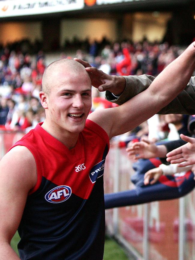 A young Nathan Jones celebrates with fans. Picture: Herald Sun