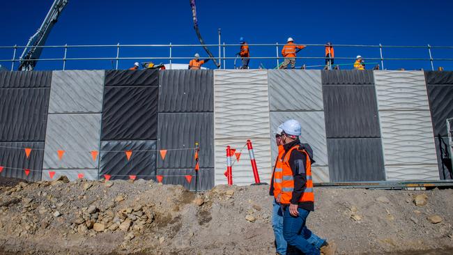 Near Millers Rd in Altona North, workers are building extra lanes on the West Gate Freeway that will tackle traffic snarls and also feed into the tunnel once completed. Picture: Jake Nowakowski