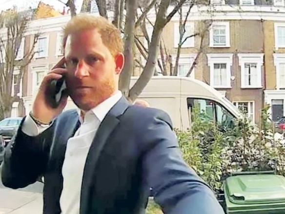 Prince Harry captured on a door bell camera in west London. Picture; The Sun