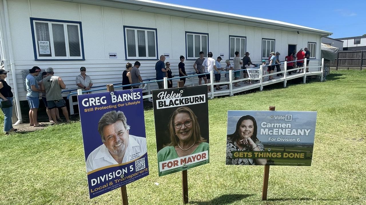 A long line of voters staying in the shade as much as possible at Bargara’s St Peter’s Church Hall polling booth.