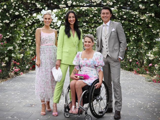 Crystal Kimber, Tayla Damir, Emma Booth and Tim Kano under the rose arbour at Flemington. Picture: David Caird