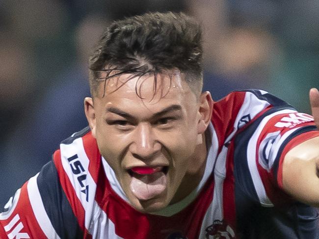 Joseph Manu of the Roosters celebrates scoring a try but it was later disallowed during the NRL Preliminary Final match between the Sydney Roosters and Melbourne Storm at the SCG in Sydney, Saturday, September 28, 2019. (AAP Image/Craig Golding) NO ARCHIVING, EDITORIAL USE ONLY