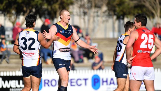 Crows ruckman Sam Jacobs celebrates one of his five goals in the SANFL against North Adelaide at Prospect Oval on Saturday. Picture: KERYN STEVENS (AAP).