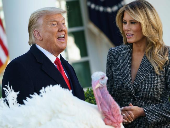 US President Donald Trump speaks after pardoning thanksgiving turkey "Corn" as First Lady Melania Trump watches in the Rose Garden of the White House. Picture: AFP