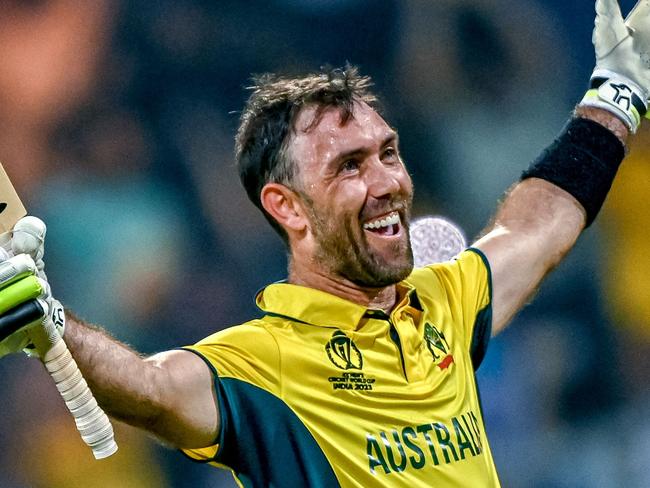 Australia's Glenn Maxwell celebrates after winning the 2023 ICC Men's Cricket World Cup one-day international (ODI) match between Australia and Afghanistan at the Wankhede Stadium in Mumbai on November 7, 2023. (Photo by INDRANIL MUKHERJEE / AFP) / -- IMAGE RESTRICTED TO EDITORIAL USE - STRICTLY NO COMMERCIAL USE --