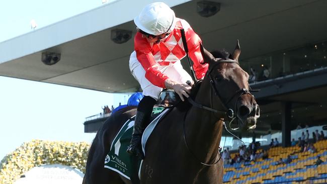 SYDNEY, AUSTRALIA - MARCH 30: James McDonald riding Orchestral wins Race 7 The Vinery Stud Stakes during Sydney Racing at Rosehill Gardens on March 30, 2024 in Sydney, Australia. (Photo by Jason McCawley/Getty Images)