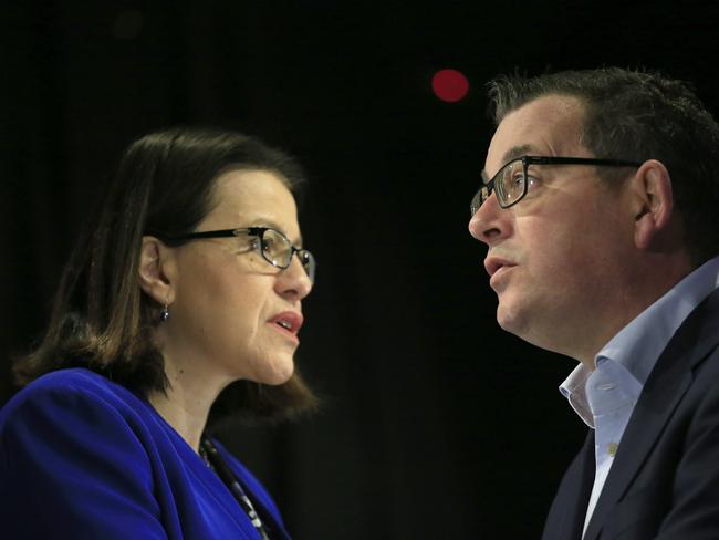 MELBOURNE, AUSTRALIA - JULY 17: (EDITORS NOTE: Image produced with multiple exposure in camera.) Victorian Health Minister Jenny Mikakos and Victorian Premier Daniel Andrews speak to the media at the daily briefing on July 17, 2020 in Melbourne, Australia. Victoria has recorded 428 new cases of coronavirus overnight and three new deaths, bringing the total number of deaths in the state from COVID-19 to 32. Metropolitan Melbourne and the Mitchell shire are currently in lockdown following the rise in COVID-19 cases through community transmissions. The new restrictions came into effect on Thursday 9 July, with residents in lockdown areas under stay at home orders until 19 August. People are only able to leave home have for exercise or work, to buy essential items including food or to access childcare and healthcare. (Photo by Darrian Traynor/Getty Images)