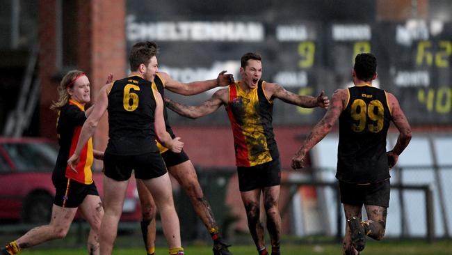 Cheltenham celebrates a goal in the last quarter against Mordialloc.