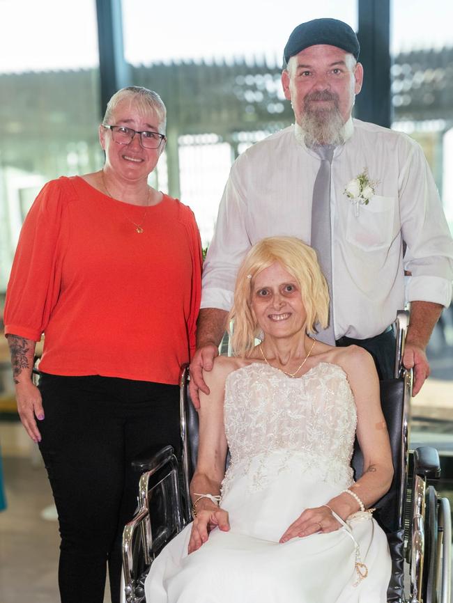 Tracy Tozer with her husband Daniel O’Halloran, with the marriage celebrant. Picture: Kirsty McVey Photography