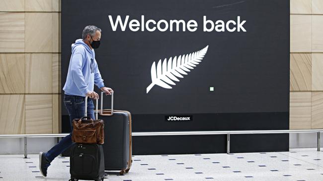 The first passengers arriving at Sydney International Airport from New Zealand on the 16th of October. Picture: Adam Yip