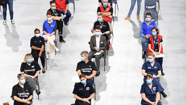 BRISBANE, AUSTRALIA - NewsWire Photos - SEPTEMBER 8, 2021. Metro North health staff listen to a briefing before the opening of the Covid-19 community vaccination hub at the Brisbane Entertainment Centre in Boondall. Picture: NCA NewsWire / Dan Peled