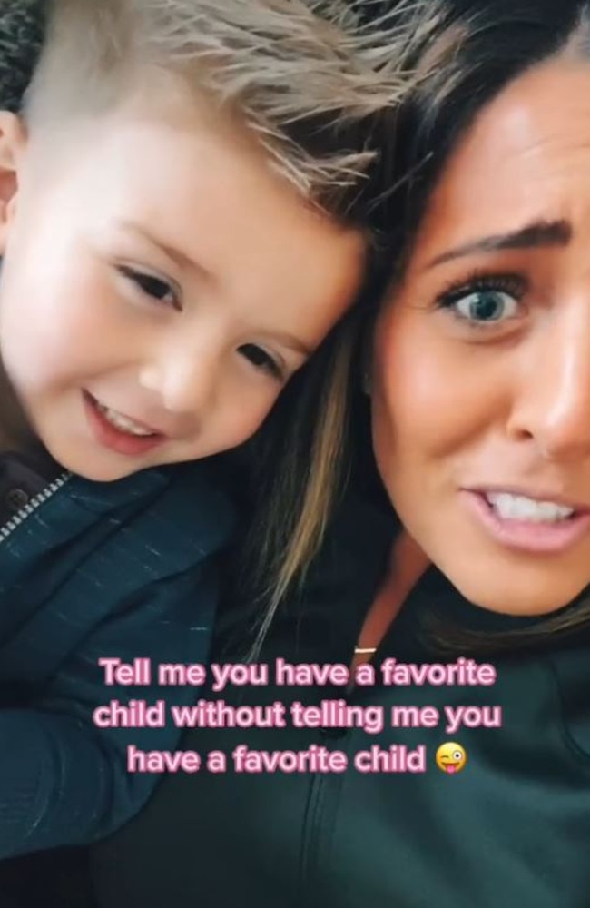 After he says he loved her, Olivia repeatedly says ‘I don’t have a favourite child’ with a cheeky grin at the camera, glancing over to him. Picture: TikTok/oliviamsmith33