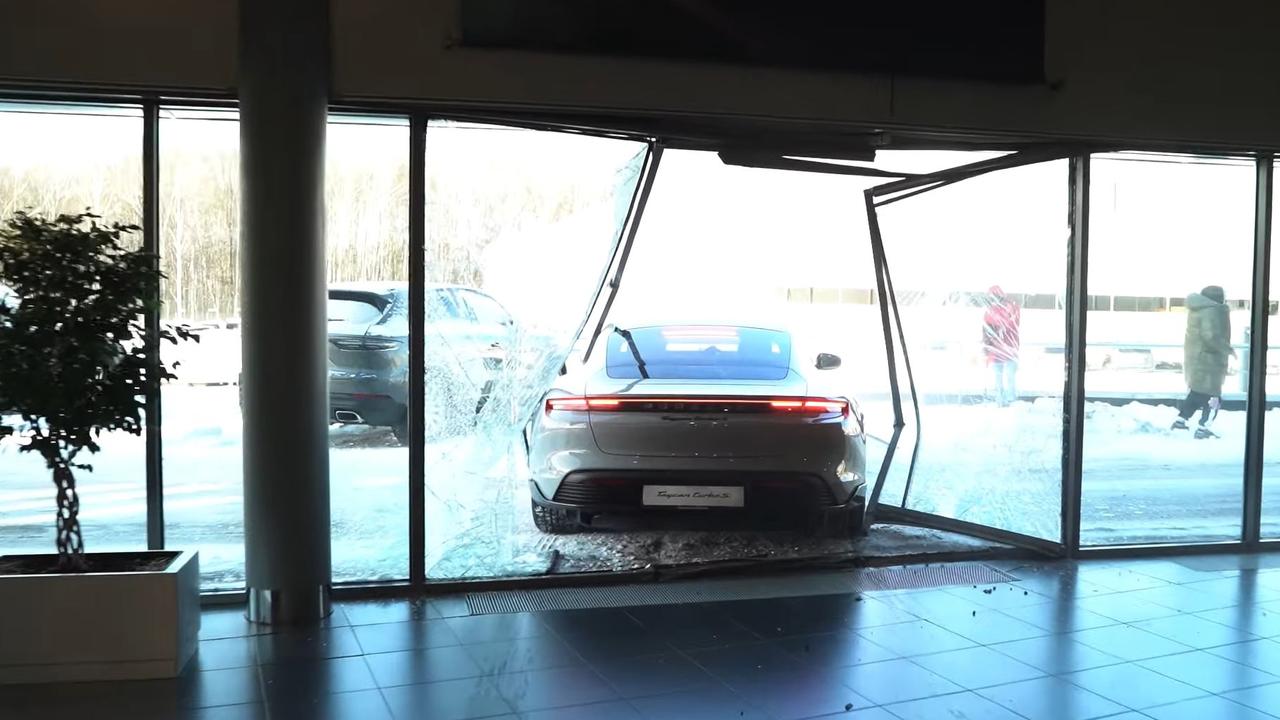 Russian YouTuber 'Litvin' crashed a Porsche Taycan through dealership walls on camera.