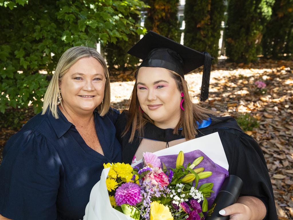 Rebecca Ketelhohn congratulates her daughter Amy Ketelhohn on completing her Bachelor of Paramedicine at the UniSQ graduation ceremony at Empire Theatres, Wednesday, December 14, 2022.