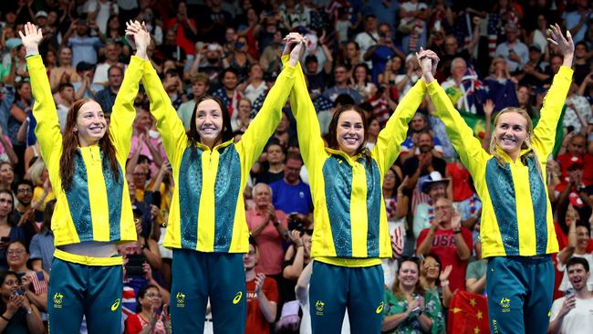 NANTERRE, FRANCE - AUGUST 01: Gold Medalists Mollie OÃ¢â¬â¢Callaghan, Lani Pallister, Brianna Throssell and Ariarne Titmus of Team Australia celebrate on the podium during the Swimming medal ceremony after the Women's 4x200m Freestyle Relay Final on day six of the Olympic Games Paris 2024 at Paris La Defense Arena on August 01, 2024 in Nanterre, France. (Photo by Adam Pretty/Getty Images)