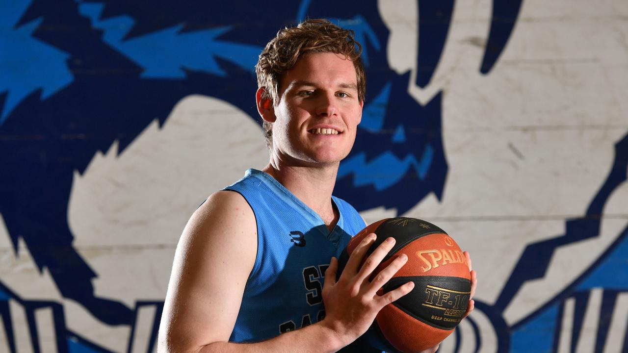 Sturt Sabres basketballer Jack Turnbull, 22, poses for a photograph at Sturt Basketball Club in Pasadena, Adelaide on Saturday the 25th of May 2019. Jack suffered a stroke three weeks ago while at Mayville State University, North Dakota in the US. He was flown back home and will need surgery in July to fix a hole in his heart. He has been given the all clear to play for Sturt again. (AAP Image/Keryn Stevens)