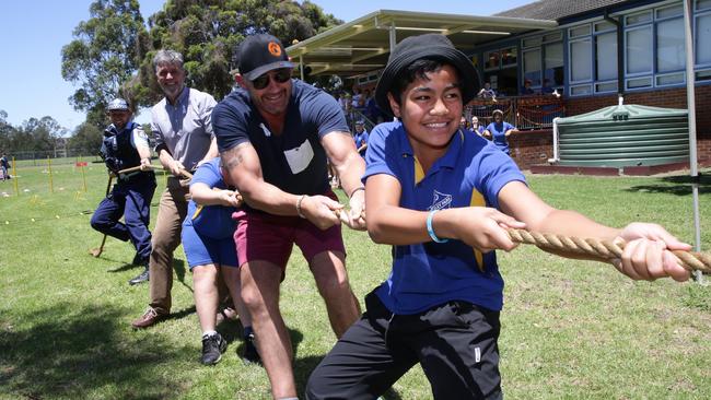 Mark Geyer lives out the DoSomethingDay philosophy ever day. Here, he supports Oxley Park Public School's White Ribbon day late last year