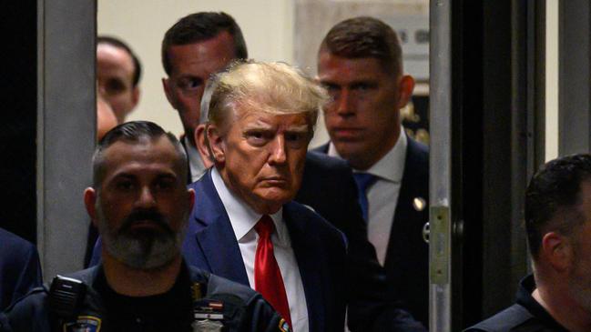 Donald Trump makes his way inside the Manhattan Criminal Courthouse on Tuesday. Picture: AFP