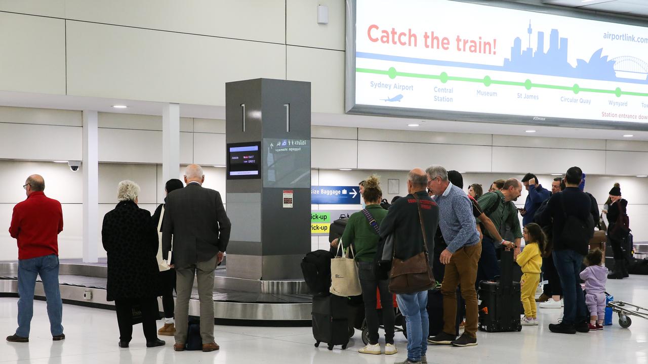 He was shocked to find that in Australia, people spread out over the length of the carousel, with the majority of people moving to the far end so that they can spot their bag and have plenty of time to prepare to take it off the conveyor belt. Picture: NCA Newswire / Gaye Gerard