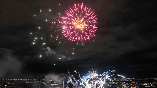 Festive fireworks explode at Tivoli park, seen from the Radisson Hotel, in Copenhagen, Denmark, on January 14, 2024, to mark the change of throne. Denmark turned a page in its history on January 14 as Queen Margrethe II abdicated the throne and her son became King Frederik X, with more than 100,000 Danes turning out for the unprecedented event. (Photo by Emil Nicolai Helms / Ritzau Scanpix / AFP) / Denmark OUT