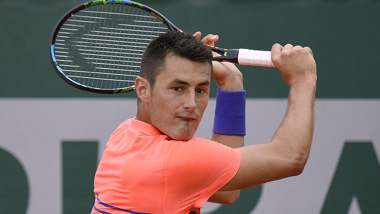 Bernard Tomic makes winning start to grasscourt season with straight ...