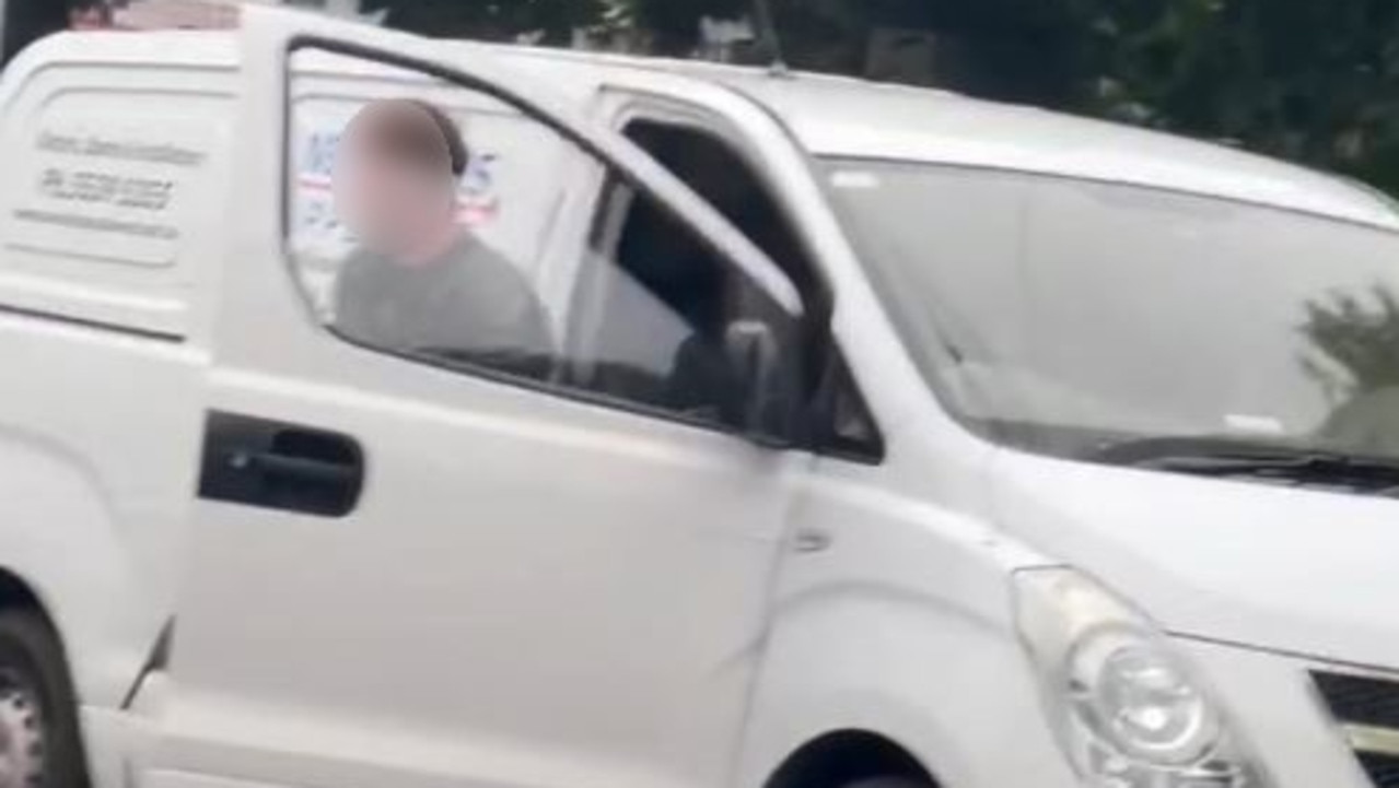 A woman managed to make a video showing a man armed with what looks like a gun entering the van.