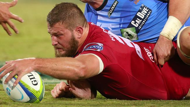 PERTH, AUSTRALIA - JULY 05: James Slipper of the Reds knocks the ball forward while being tackled by Hugh McMeniman of the Force during the round 18 Super Rugby match between the Western Force and the Queensland Reds at nib Stadium on July 5, 2014 in Perth, Australia. (Photo by Paul Kane/Getty Images)