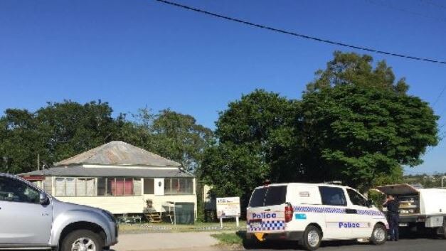 Police investigate a house on Rifle Range Rd that was the scene of a violent home invasion in November 2018.