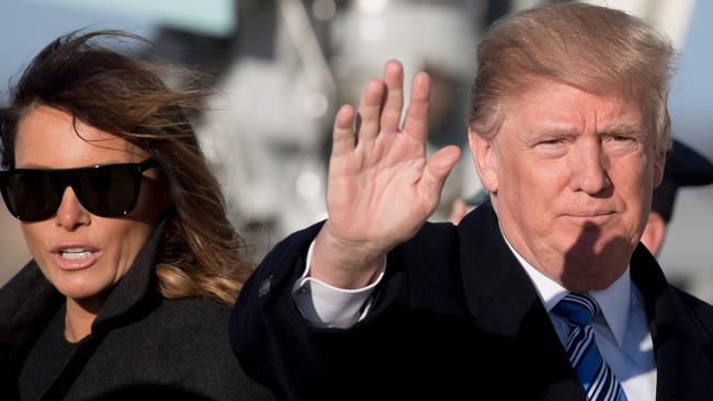 US President Donald Trump, pictured with First Lady Melania, is said to be fuming over negative publicity and headlines. Picture: Jim Watson/AFP