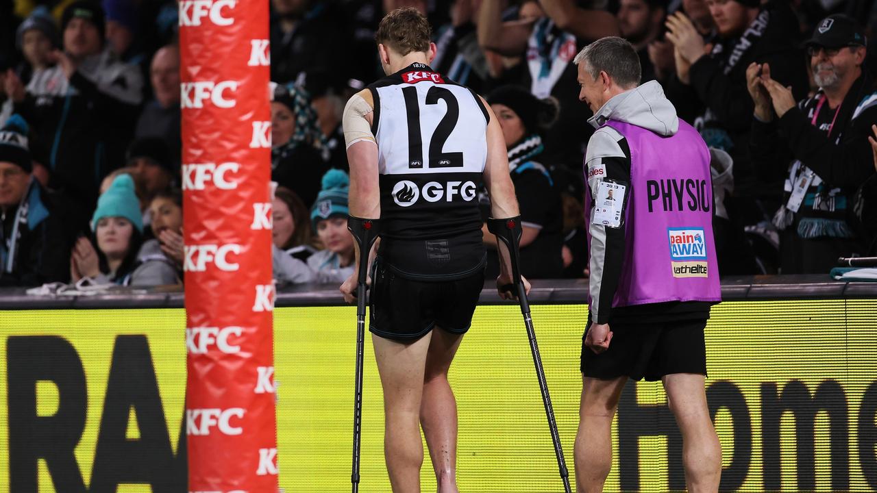 McKenzie left the game with an ankle injury. Picture: Getty Images