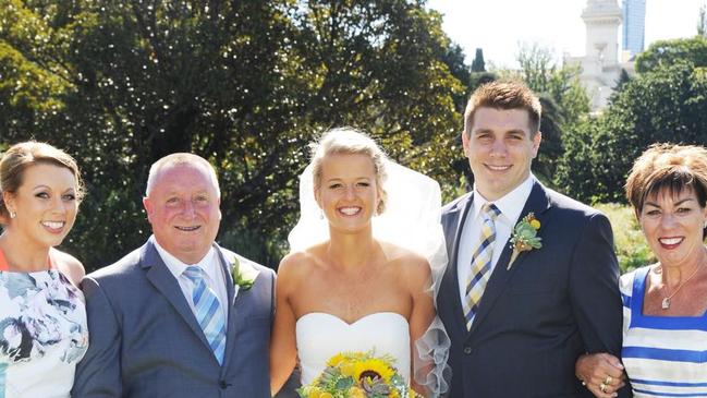 Rodney Patterson, centre, with daughter Lisa, left, daughter-in-law Brooke, son Todd and wife Maree, far right.