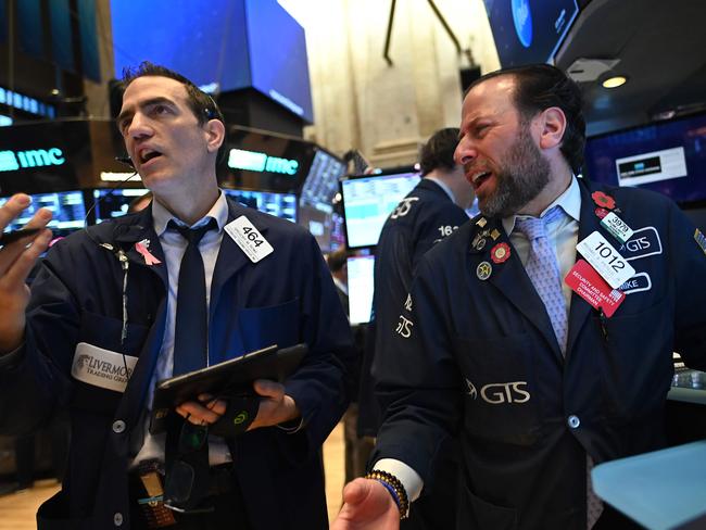 Traders work during the opening bell at the New York Stock Exchange. Picture: AFP