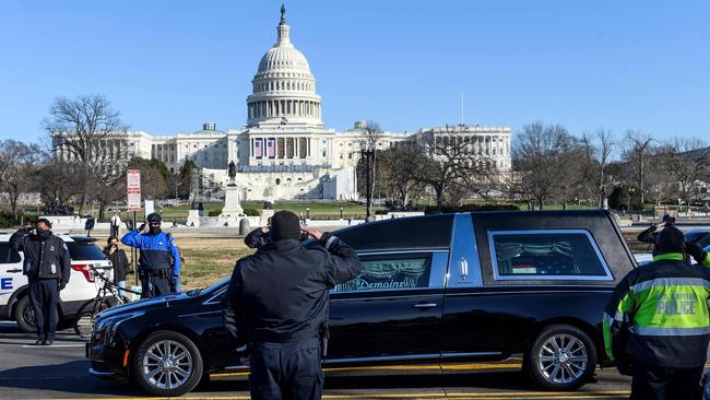 The coffin of fallen police officer Brian Sicknick passes during a funeral procession in Washington, DC. Picture: Andrew Cabellero-Reynolds/AFP